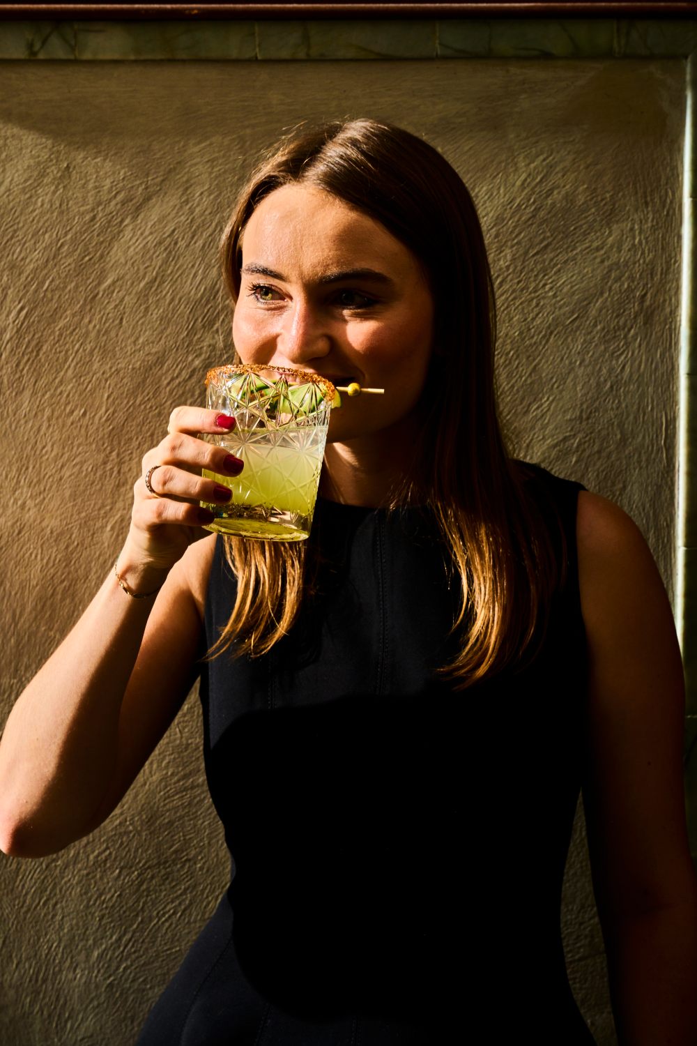 Comparti bar service — premium spirits selection including Hibiki and Van Winkle