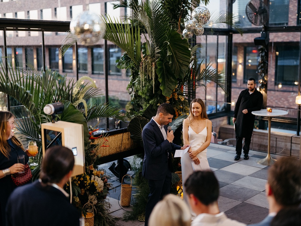 Comparti rooftop wedding ceremony vows in New York City